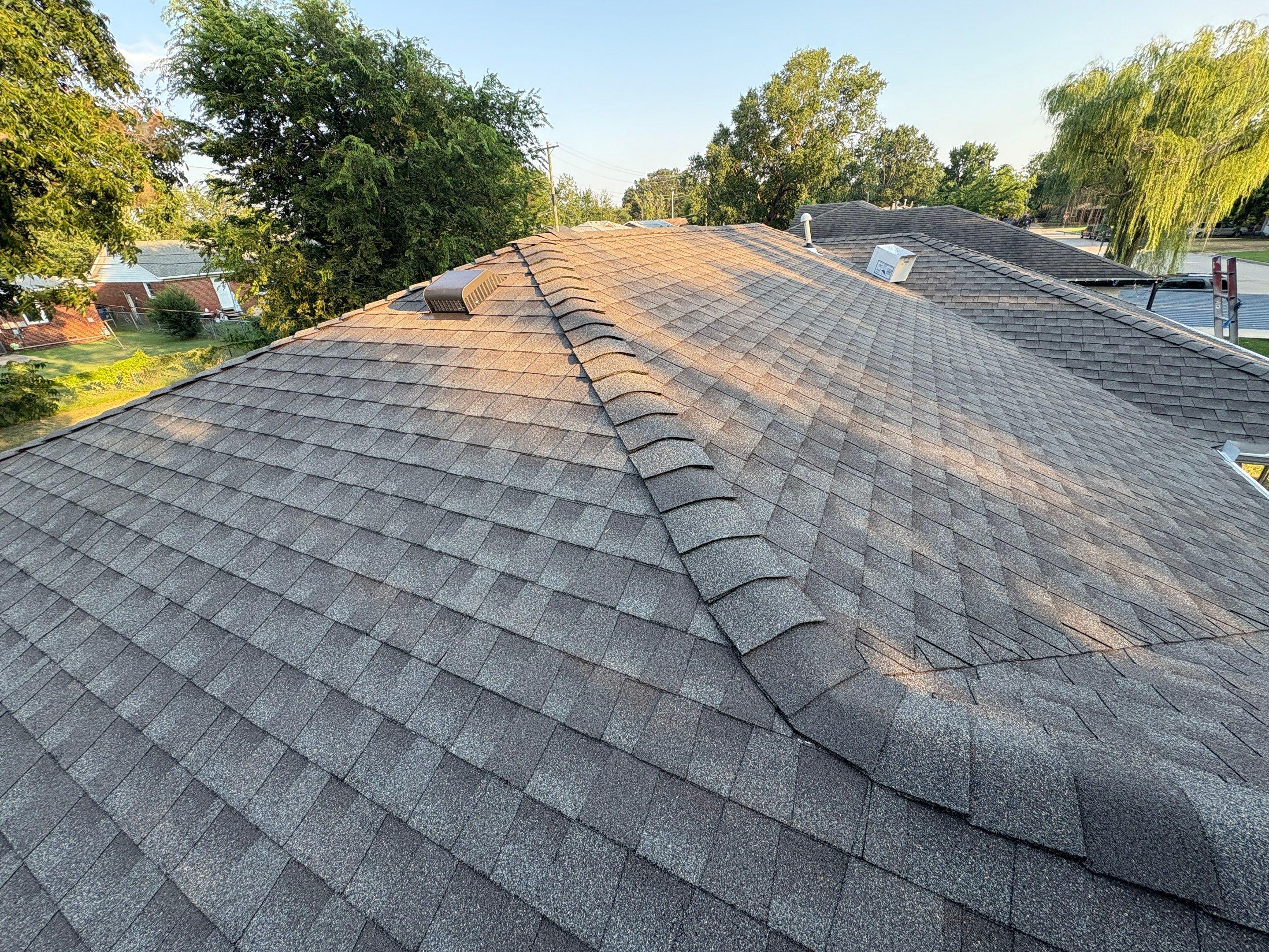 Tulsa home with seamless gutters and a finished roof