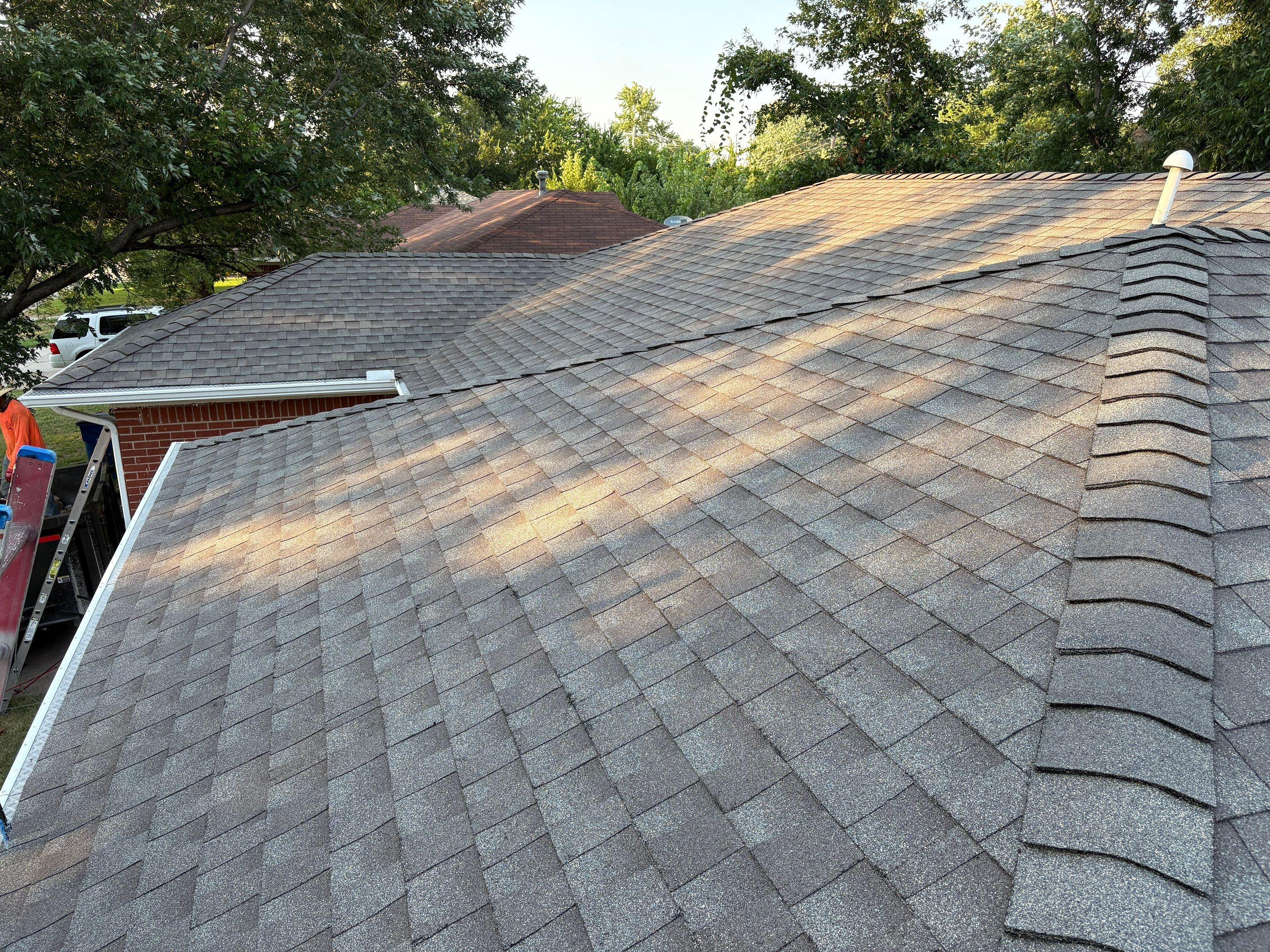 Completed roof replacement on a veteran's home in Tulsa