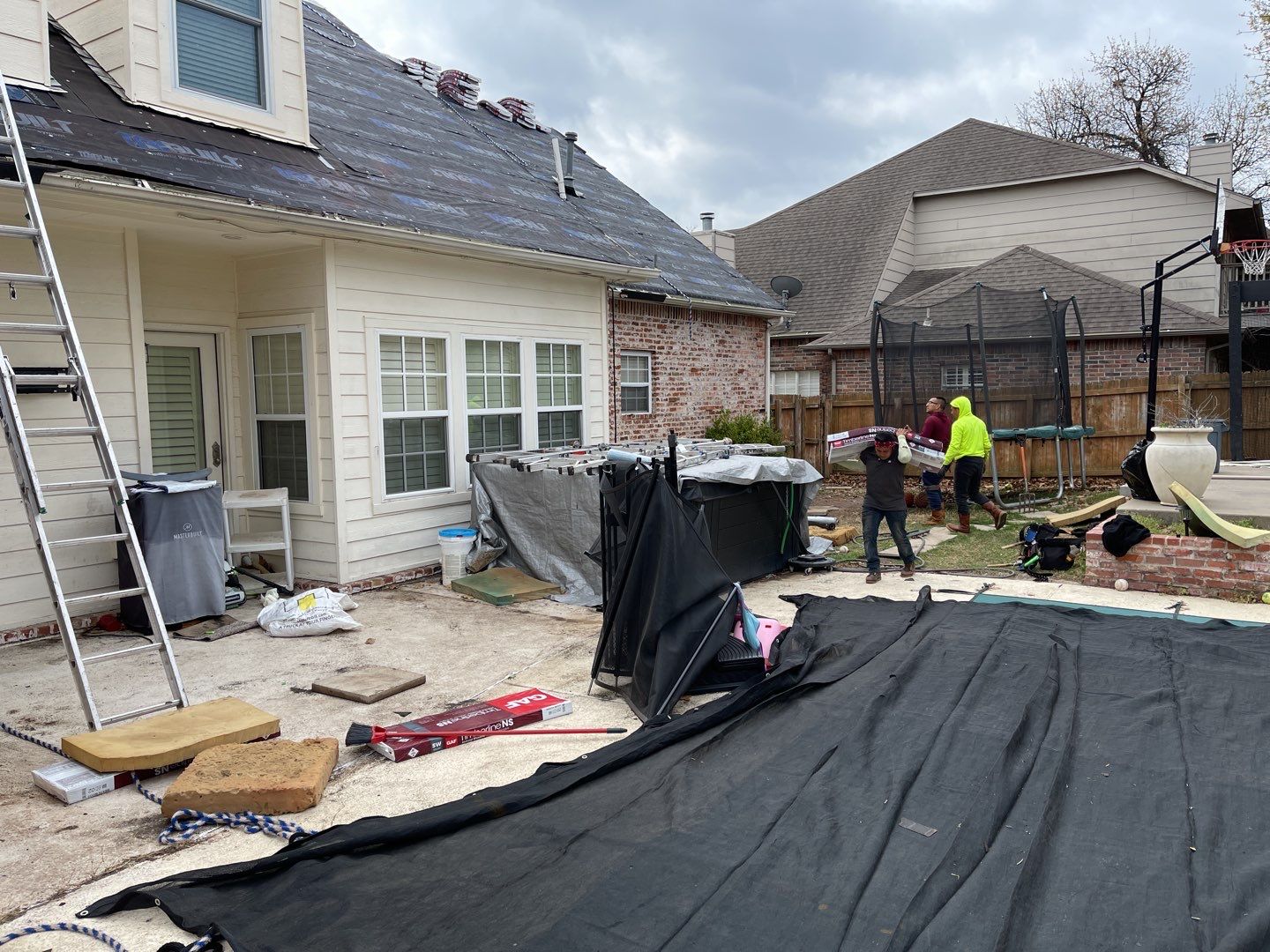 AJC pool and property protection tarps during roof tear-off in Tulsa