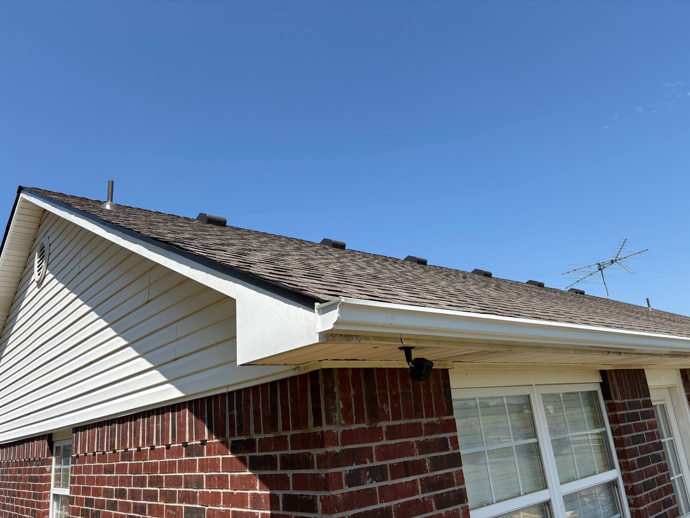 Sapulpa home new seamless gutters installed after full insurance-covered roof and gutter replacement